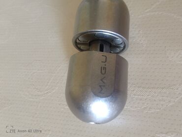 Oyuncaqlar: Metal maqnitli usaqlar ucun elde oynadilan oyuncaq metal spinner