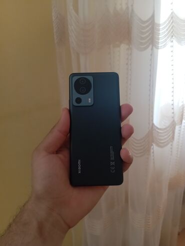 телефон fly андроид 4 2: Xiaomi 13 Lite, 256 GB, rəng - Qara, 
 Sensor