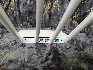 iphone 13 pro max irshad: Xiaomi Mi Router 3C Wi‑Fi routeri Xüsusiyyətlər: - 4 yüksək qazanclı — 7