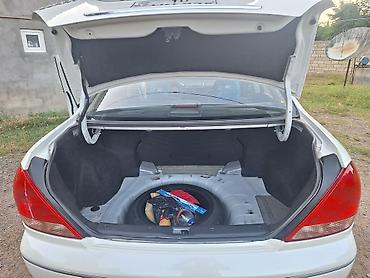 hyundai i30 oluxanası: Nissan Sunny: 1.6 l | 2007 il Sedan — 9