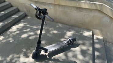 elektrikli bisiklet: Özüm almisam Xiomi model scooter heçbir detalinda problem yoxdu ön