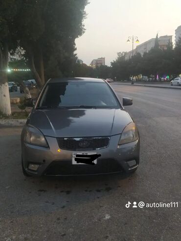 фольксваген поло 1: Kia Rio: 1.5 l | 2010 il Hetçbek