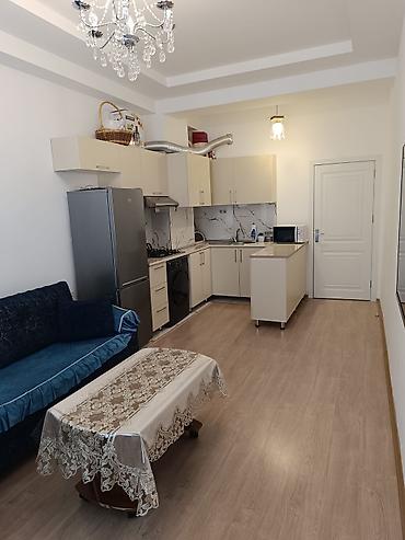 kupca: 2 otaqlı, Yeni tikili, 69 kv. m — 3