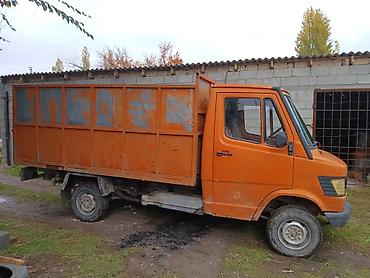 шпатлёвка авто: Грузовой автомобиль Mercedes-Benz (серия T2/Transporter) оранжевого — 4
