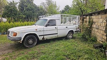 QAZ: QAZ 3110: 2.4 l | 1998 il Sedan — 16