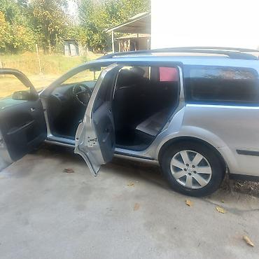 ман радиятор: Ford Mondeo: 2002 г., 2 л, Автомат, Бензин, Универсал — 4