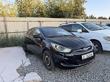 салярись: Hyundai Solaris: 2012 г., 1.4 л, Механика, Бензин, Хэтчбэк — 3
