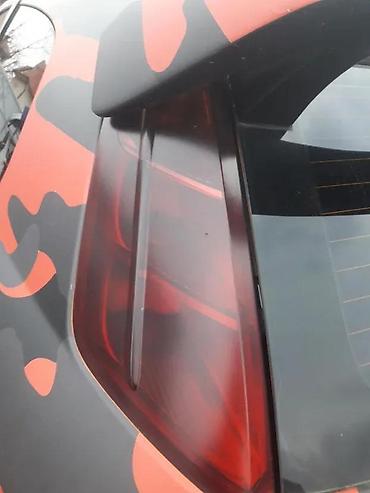 cerada za auto: FIAT GRANDE PUNTO ZADNJA LEVA ZATAMLJENA STOP LAMPA | Fiat Grande — 1
