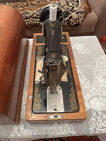 Tikiş maşınları: Mexaniki tikiş maşını – stolüstü, qoldan fırladılan model — 1