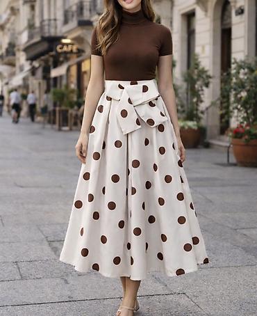 Suknje: ✅Midi suknja sa tufnama i velikom mašnom u struku
✅2750 din — 4