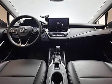 coroll: Toyota Corolla: 2023 г., 1.8 л, Гибрид — 8