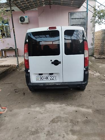 Fiat: Fiat Doblo Cargo, ağ rəng, yükdaşıma üçün praktik furqon. Texniki və — 2