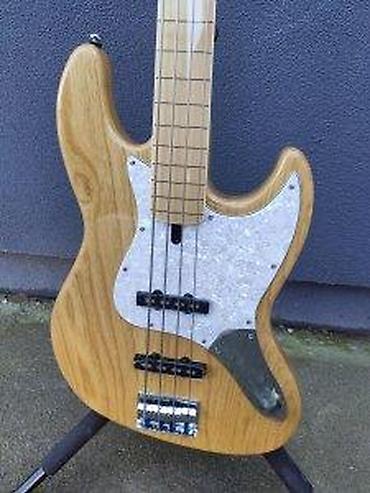Gitare: SIRE MARCUS MILLER V7 SWAMP ASH 4-STRING FRETLESS B-STOCK | Slanje — 10