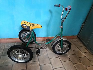 Детские велосипеды: Детский велосипед советского образца, небольшого размера. Основные — 8