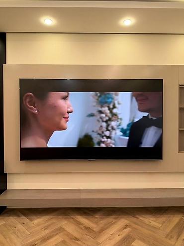 Телевизоры: Телевизор Smart TV с крупной диагональю (около 55–65"), тонкими — 49