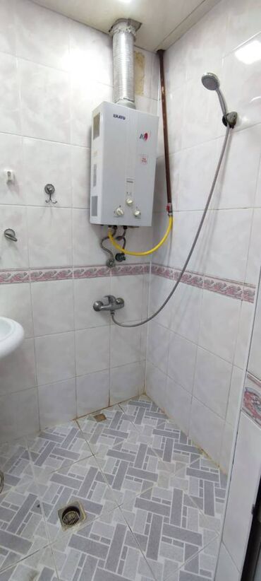 Uzunmüddətli kirayə mənzillər: Nərimanov rayonu Nərimanov metrosunun yaxınlığında köhnə tikili — 12