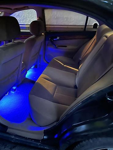 e34 2 5: Daewoo Magnus 2004г. Седан черного цвета.Просторный 5‑местный салон в — 3
