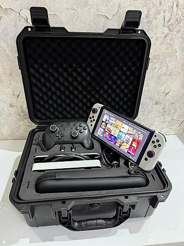 nintendo advance sp: Портативный игровой комплект Nintendo Switch OLED в защищённом кейсе — 2