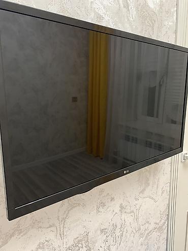 дисплей для машины: Телевизор LG с диагональю 32. Тонкие рамки, глянцевая панель — 1