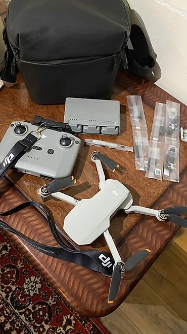 портативная станция: DJI Mini 4k Ультралёгкий складной квадрокоптер с камерой 4K. На луче — 2