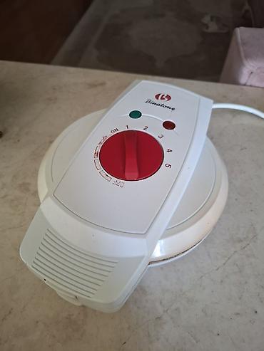 sky electronics: Binatone TWT-910 vafli aparatı Xüsusiyyətlər: - Güc: 900 W - Qızmayan — 5