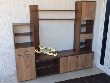 Komode: TV komoda od bele iverice 2.30m duzine. Moguca izrada i dugih — 9