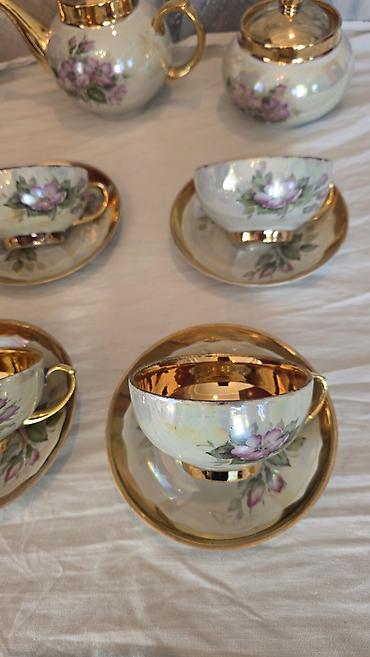 Uşaqlar üçün digər mallar: Çay sevizi. 6- nəlbəki, 6- fincan, 1- çaynik, 1- süd qabı, 1- şəkər — 7
