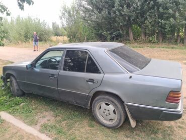 ключ фольксваген: Седан Mercedes-Benz E-Class W124 в сером цвете, оснащенный люком и