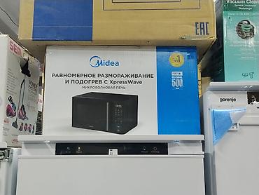 Микроволновая печь Midea с технологией XpressWave. На упаковке