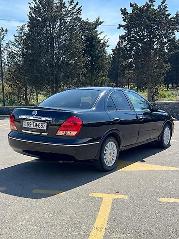mini cooper kreditle: Nissan Sunny: 1.6 l | 2006 il Sedan — 4
