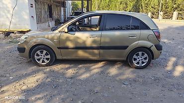 фольксваген тигуан л с: Kia Rio: 1.6 л | 2006 г. Седан — 4