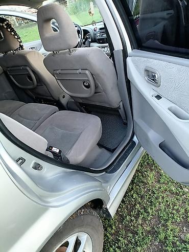 машина на час: Nissan Almera Tino: 2002 г., 2 л, Вариатор, Бензин — 7