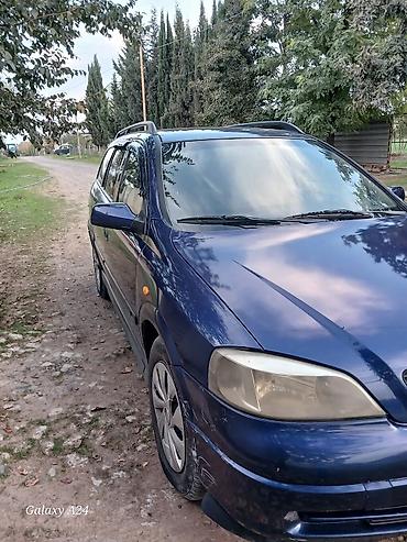 Продажа авто: Opel Astra Caravan (universal), mavi rəng. - Kuzov: universal, dam — 6