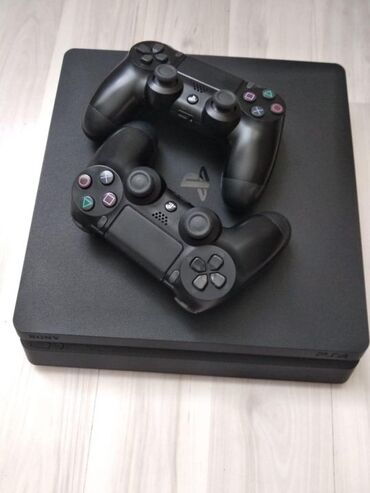 sony xperia: Playstation 4 Slim 1 TB + 2 Dualshock + 15 Oyun Playstation əla at lalafo.az sony xperia: Playstation 4 Slim 1 TB + 2 Dualshock + 15 Oyun Playstation əla