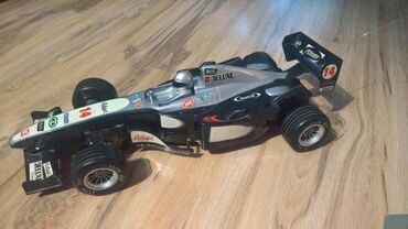 Igračke: 1. Formula 1 nema daljinski Crno Siva 44 x 18 cm 2. Formula crvena — 1