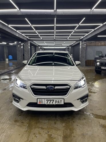дом на кол: Subaru Legacy, белый седан Основные характеристики: - Полный привод