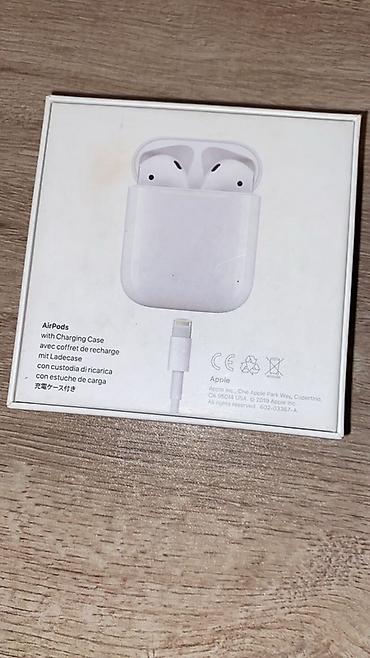 marshall qulaqliq: Apple AirPods with Charging Case (Model: MV7N2ZM/A) - Qablaşdırma — 2