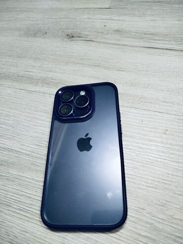 телефон в канте: IPhone 14 Pro, Б/у, 128 ГБ, Deep Purple, Защитное стекло, Кабель, Коробка, 87 %