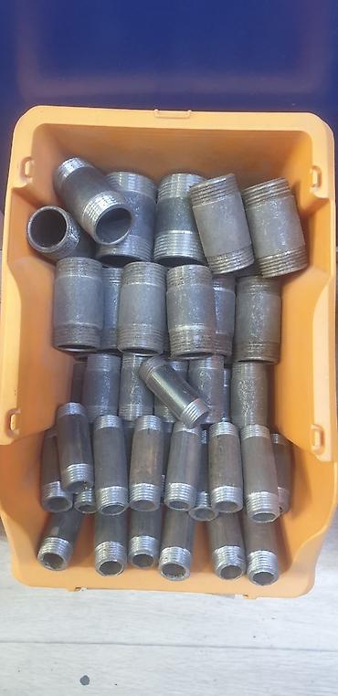 Другая сантехника: Металлическая деталь цилиндрической формы с несколькими кольцевыми — 24