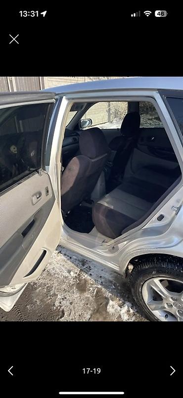 Mazda: Mazda 323: 2004 г., Хэтчбэк — 15