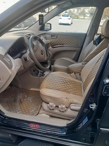 cherry masin: Kia Sportage – qara rəngli, şəhər və yolsuzluq üçün əlverişli kompakt — 5