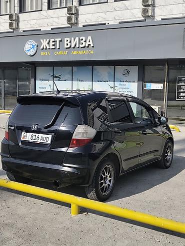 mazda 323 2003: Honda Jazz: 2009 г., 1.4 л, Автомат, Бензин, Хэтчбэк — 4