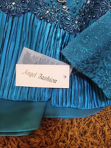 qadın jaketi: Angel Fashion qadın dəsti - Rəng: firuzə-mavi - 3 hissə: jaket, ətək — 4