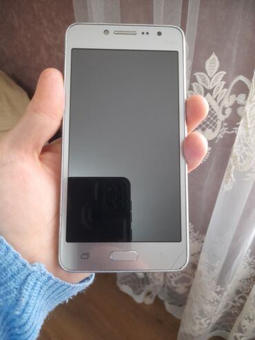 ipan mini 5: Samsung j2.zaryatka yeri xarabdi.ya da batareykasi.zaryatka yeri