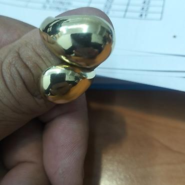 kolca: Qızılı rəngdə açıq dizaynlı iki başlı üzük - Material: metal alaşım — 1