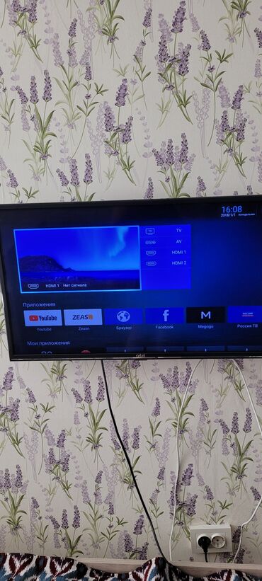 телевизор с интернетом: Телевизор Artel с функцией Smart TV. Позволяет просматривать видео с