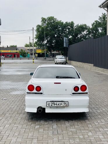 машина с российскими номерами: Nissan Skyline: 1999 г., 2.5 л, Автомат, Бензин, Седан