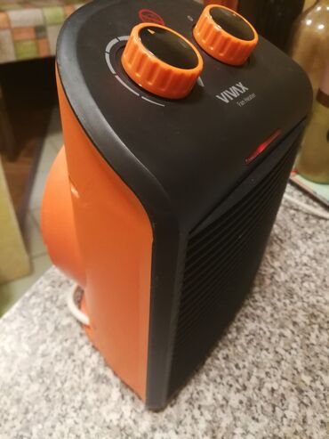 Kaloriferi: Grejalica duvaljka 2 brzine plus ventilator Vivax 2000w. Ispravna na lalafo.rs — 5 Kaloriferi: Grejalica duvaljka 2 brzine plus ventilator Vivax 2000w. Ispravna — 5