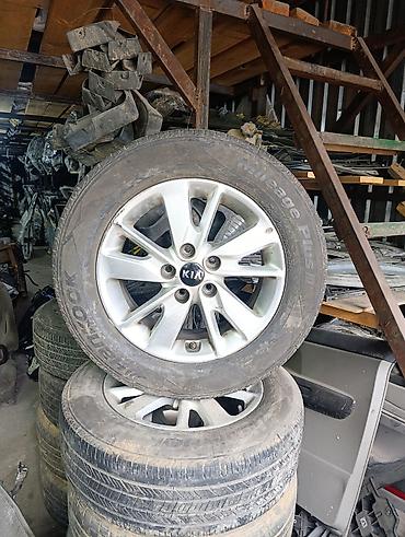 Диск с шиной KIA - Литой оригинальный диск KIA, 10‑спицевый