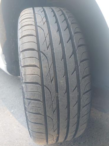 disqler: Satılır: Yay mövsümü üçün avtomobil şini Ölçü: 215/40 ZR17 87W Tip — 4